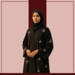 Black open abaya with pink bow embroidery and tassel hem – Zeenaya