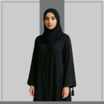 Black abaya with embroidered bows and tassel trim – Zeenaya
